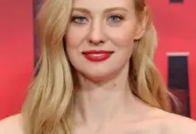 Deborah Ann Woll smiling at an event