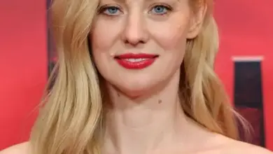 Deborah Ann Woll smiling at an event