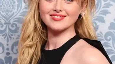 Kathryn Newton smiling at a film premiere