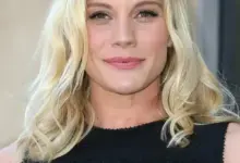 Katee Sackhoff smiling at an event