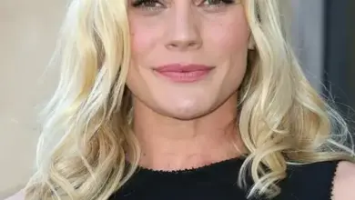 Katee Sackhoff smiling at an event
