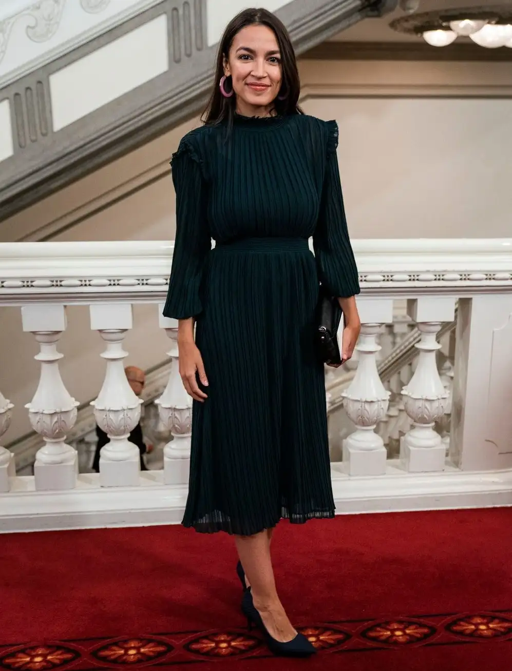 Alexandria Ocasio-Cortez posing at a event