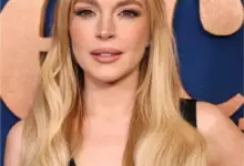 Actress Lindsay Lohan smiling at a film premiere