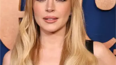 Actress Lindsay Lohan smiling at a film premiere