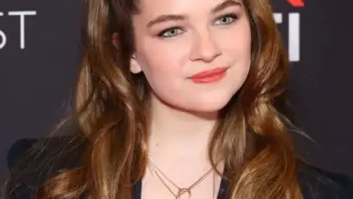 Raegan Revord smiling at an event